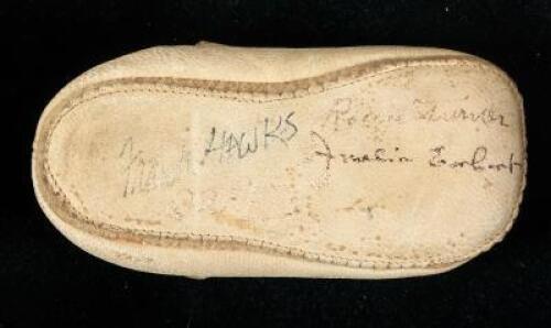 Baby shoe signed by aviators Amelia Earhart, Roscoe Turner, Frank Hawks, and Admiral Richard Byrd