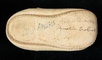 Baby shoe signed by aviators Amelia Earhart, Roscoe Turner, Frank Hawks, and Admiral Richard Byrd