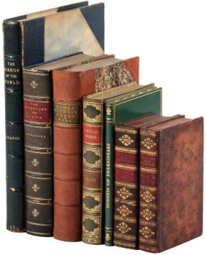 Seven leather-bound volumes