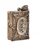 Filigree silver case in the shape of a book