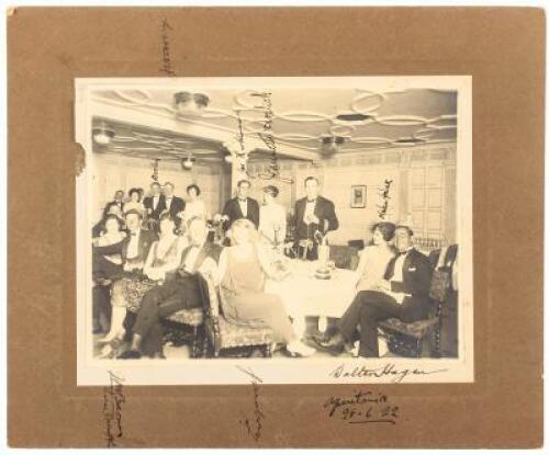 Photograph of Walter Hagen and other American golfers aboard the S.S. Aquitania after winning the 1922 Open Championship. - Signed by Hagen and others