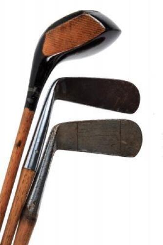 Three wood shaft golf clubs from Wilson or McGregor