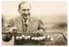 Original photograph of Bernard Darwin with the President's Putter golf trophy