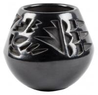 Small black pot with deeply incised decoration