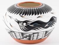 Large painted pot with serpent and feather designs