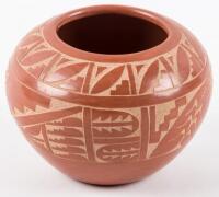 Small carved red pot