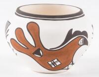 Small white pot with painted bird designs