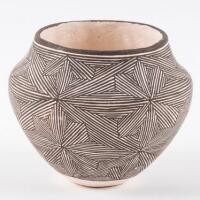 Small white pot with intricate painted design