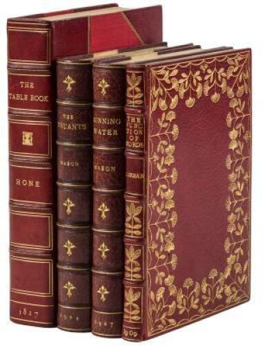 Four finely bound volumes