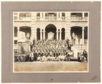 Original silver photograph of a sizable contingent of Shriner's in costume, gathered on the steps of the 'Iolani Palace in Honolulu, Hawaii