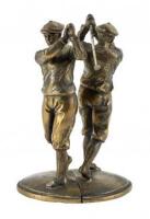 Bronze bookends of a male golfer