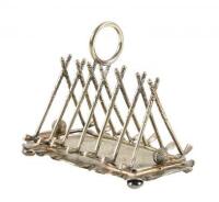 Silverplate tray with seven pair of crossed clubs