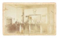 Albumen photograph of the interior of a bar, identified as McNelly's Saloon in Globe, Arizona