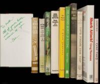 Eleven volumes of golf books - all signed