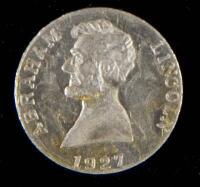Aluminum token with Lincoln portrait