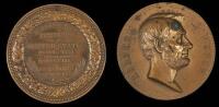 Two bronze medals of Abraham Lincoln
