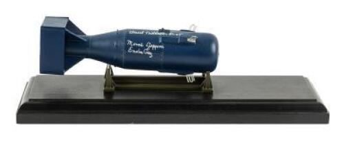 Scale model of the "Little Boy" atomic bomb, signed by Paul Tibbets and two other Enola Gay crew members