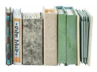 Seven miniature editions of writings by John Muir or works inspired by him
