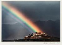 "Rainbow over the Potala Palace" - original color photograph by Rowell, signed by him on the back of the print and on the mat
