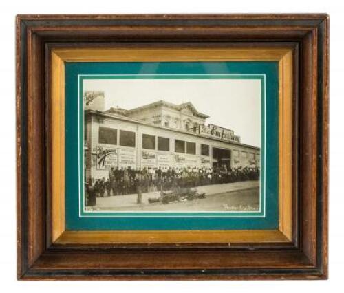 Original silver photograph of the temporary quarters of the Emporium department store on Van Ness Avenue at Post Street, with employees gathered in front