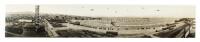 Panorama photograph of the U.S. Pacific Fleet at anchor in Monterey Bay, with air cover