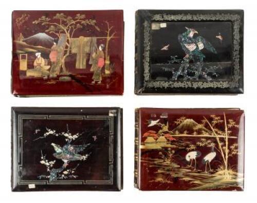 Four empty decorative Japanese photograph albums