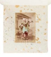 Album with 24 hand-colored photographs of Japanese scenes and people