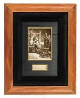 Cut signature "Emma" framed with a photograph