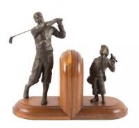 Pair of bookends depicting and golfer and his caddie