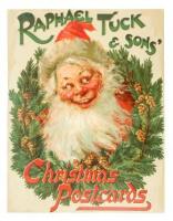 Chromolithographed poster for Raphael Tuck & Sons' Christmas Postcards featuring the head of Santa Claus surrounded by a wreath