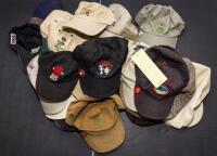 Approximately 25 ball caps and hats