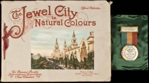 A view book and a participant's badge for the Panama-Pacific International Exposition in San Francisco