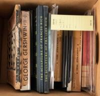 Shelf of books by or designed by Merle Armitage