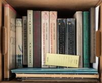 Shelf of books by or designed by Merle Armitage