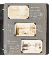 Photograph album of flood and storm damage images, World War One soldiers