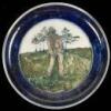 Stoneware plate with incised golfing scene