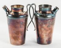 Pair of silver-plate pitchers with engraved golfing scenes
