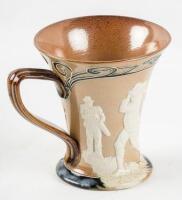 Stoneware fluted stein with relief illustration of golfers