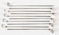 Ten silver-plate cocktail stirrers in the form of golf clubs