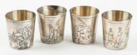 Set of four silver-plate cups with engraved golfing scenes