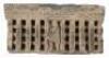 Relief carving in stone with a central figure in a row of pillars - 3