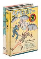 Two editions of Speedy in Oz with dust jackets