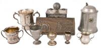 Group of 8 golfing trophies, several sterling silver