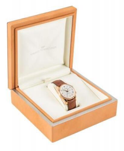 GIRARD PERREGAUX: An 18K Rose Gold Traveller II Automatic Calendar Wristwatch with Alarm and Dual Time Zone, Ref. 4940