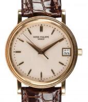 PATEK PHILIPPE: An 18K Gold Automatic Calendar Wristwatch, Ref. 3802