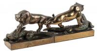 Metal bookends - lion vs. alligator