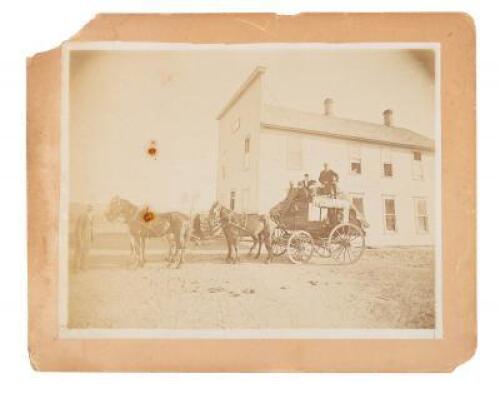 Original sepia-tone silver photograph of a stagecoach at Red Rock, Montana