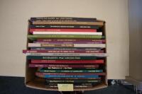 Twenty-five volumes of Lord John Press books
