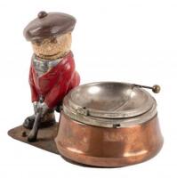 Dunlop Man cast iron and bronze ashtray with movable head
