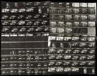 Eight contact sheets with approx. 30 photographic images apiece of Jimi Hendrix performing on stage